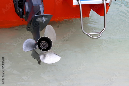 фотографія Close up three blade stainless impeller of motor boat, jet ski