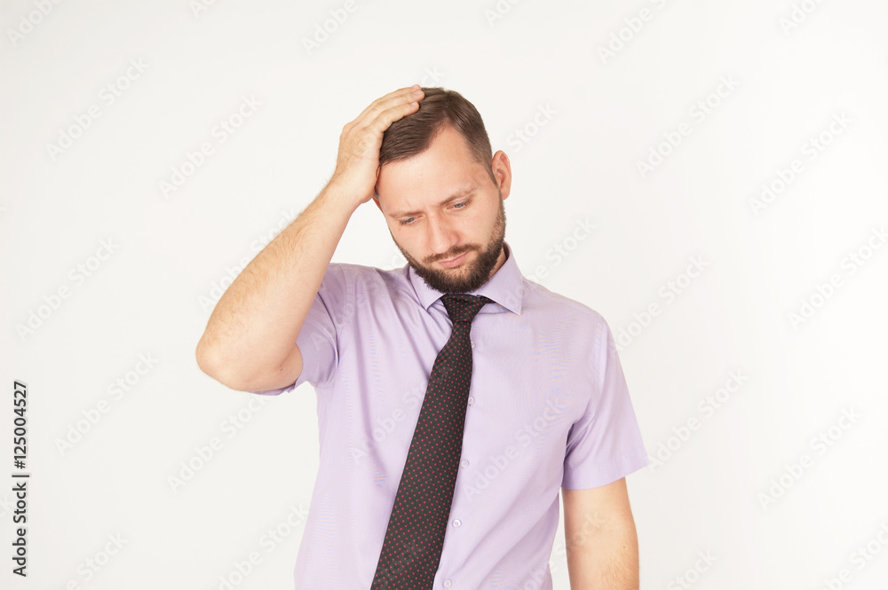 Young man forget something and trying to remember or headache concept, isolated on white background. Worried young businessman thinks about solving problem or feeling guilty Young man forget something and trying to remember or headache concept, isolated on white background. Worried young businessman thinks about solving problem or feeling guilty