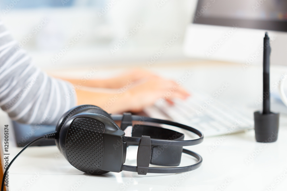 Designer using graphic tablet at office Designer using graphic tablet at office