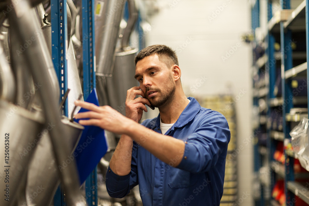 auto mechanic with clipboard at car workshop auto mechanic with clipboard at car workshop