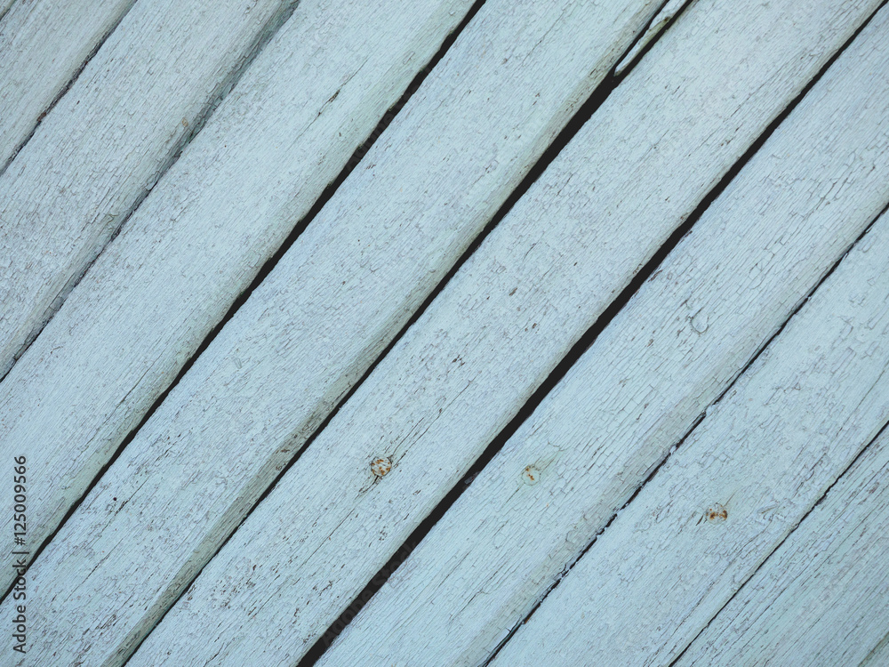 Old wooden background from the remains of paint and traces of use Old wooden background from the remains of paint and traces of use
