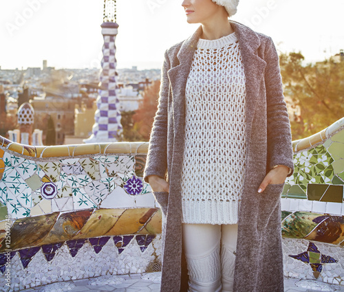 Canvas Print modern woman at Guell Park in Barcelona, Spain looking aside