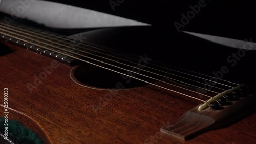 Opening leather six string guitar case. Safety, protection, beginning or performance concept. 4K close up video