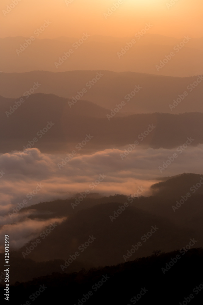 Morning sunrise in mountain and sea of fog in Doi Samer Dao Nan province Thailand national park