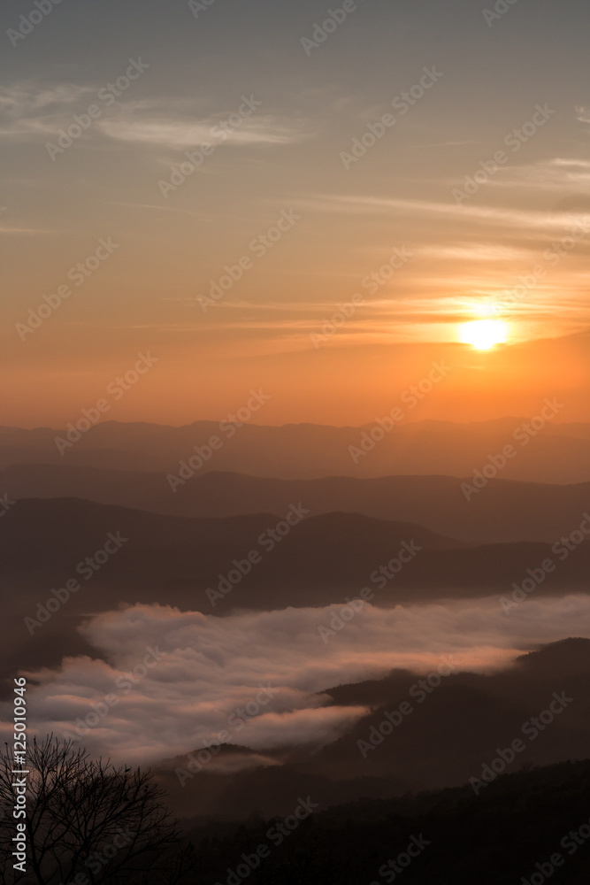 Morning sunrise in mountain and sea of fog in Doi Samer Dao Nan province Thailand national park