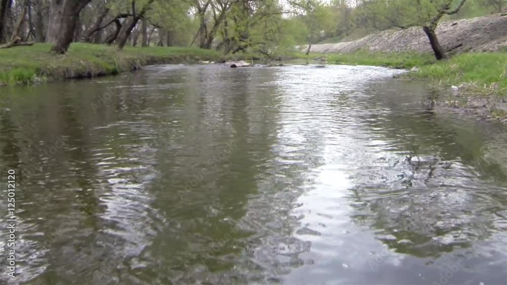 Drone fly above mountain river under tree Drone fly above mountain river under tree
