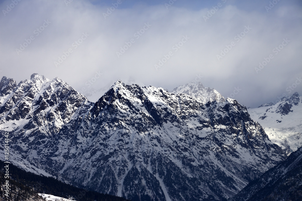 Snow sunlight mountain in haze at winter day Snow sunlight mountain in haze at winter day