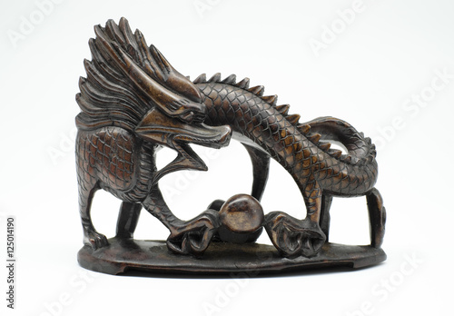 dragon statue on white colour background photo