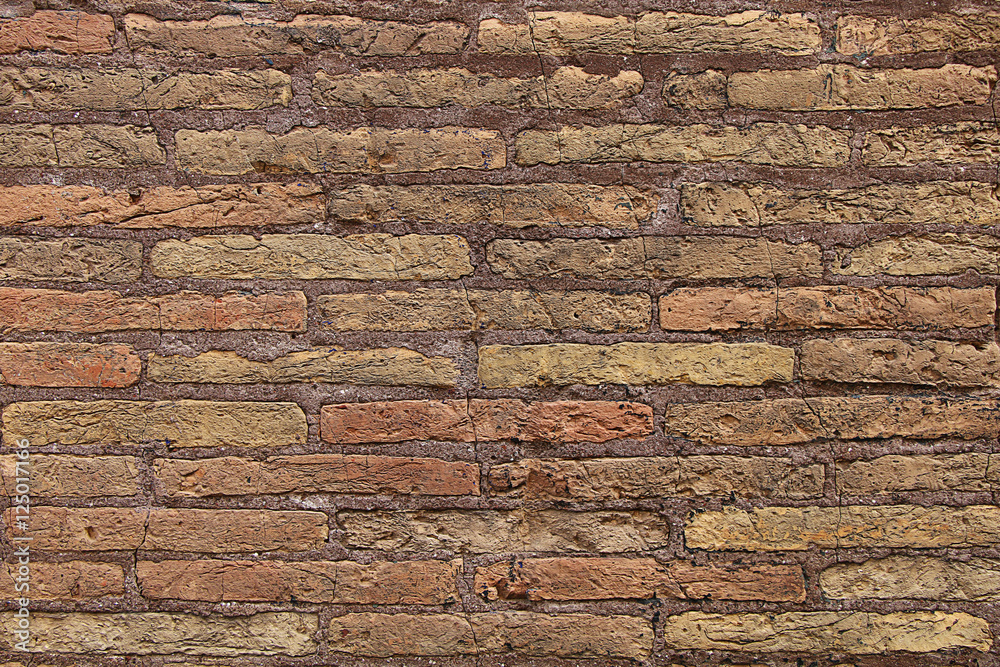 Texture - a wall of very old crumbling stones Texture - a wall of very old crumbling stones