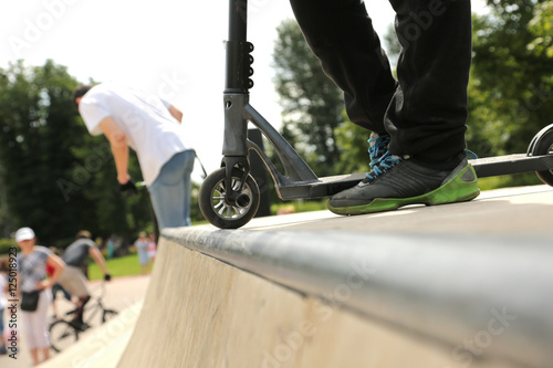 Riding the scooter
