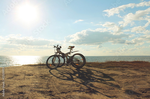 Fototapeta Naklejka Na Ścianę i Meble -  Two bicycle at sunset