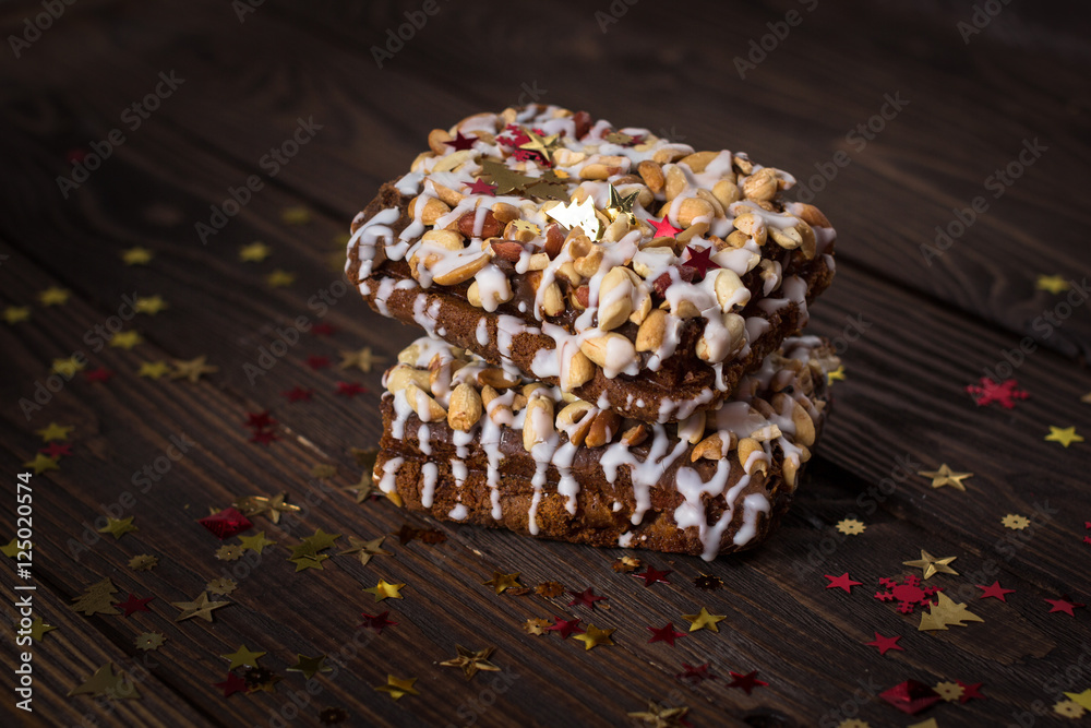 piece of cake, cookies with nuts and white icing, Christmas star