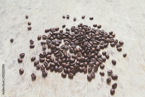 coffee bean on old wood background,coffee bean