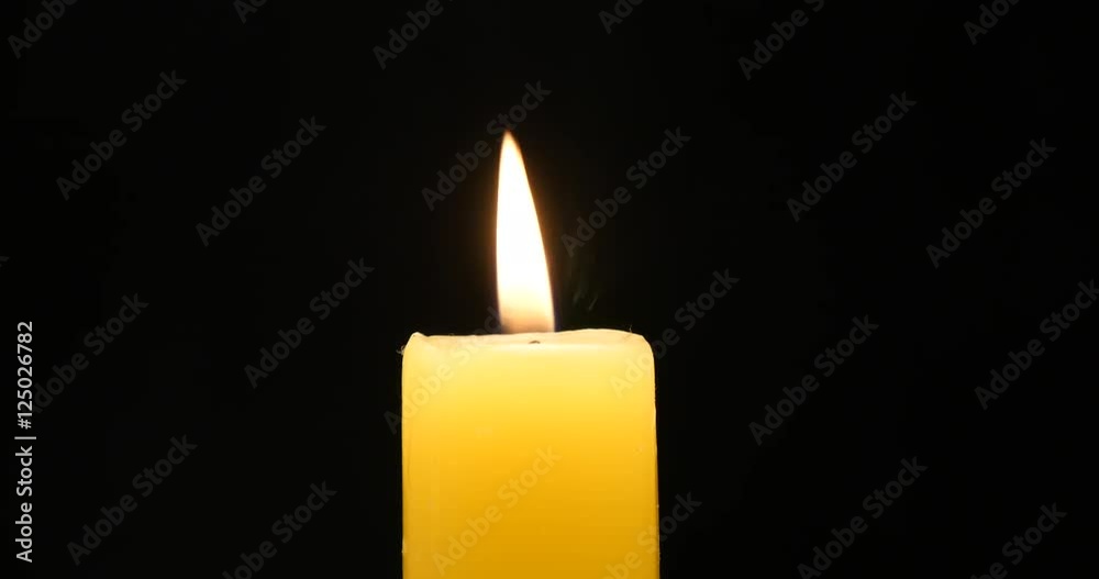 Yellow Candlelight burn bright on black
Yellow Candlelight burn bright on black