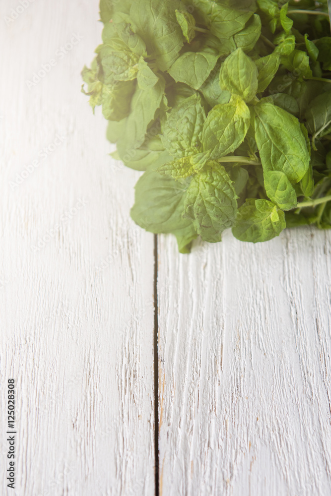 Fresh peppermint on wood