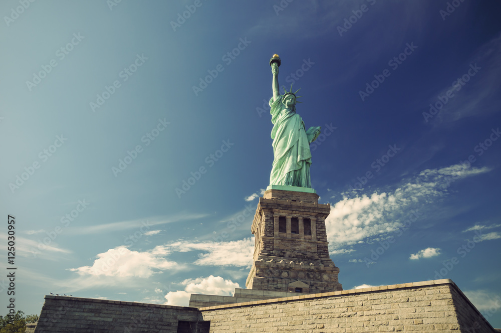 Statue of Liberty on Liberty Island on a sunny day, New York City, USA, vintage filtered style