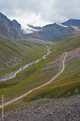 View from mountain pass on the road, the peaks, glaciers,
