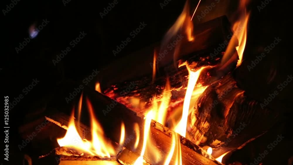 the fire and the wood in the fireplace the fire and the wood in the fireplace