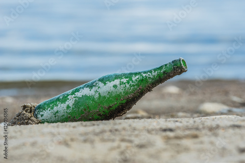 Fotografie Flaskan på stranden
