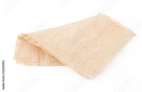 Burlap napkin isolated on white background. Top view.