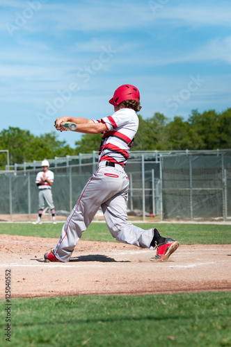 High school baseball player up at bat