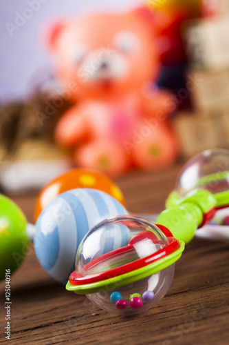 Pile of toys, collection on wooden background