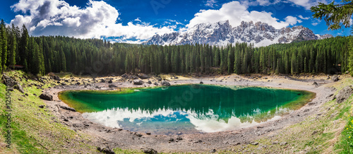 Breathtaking view to mountain Carezza lake in Dolomites, Italy