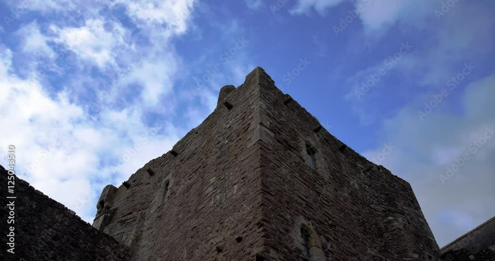 time-lapse of clouds passing over scottish castle tower battlements time-lapse of clouds passing over scottish castle tower battlements