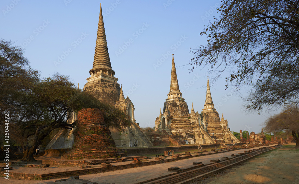 Fototapeta premium Ancient stone temple on sunny day in Ayuttaya, Thailand.