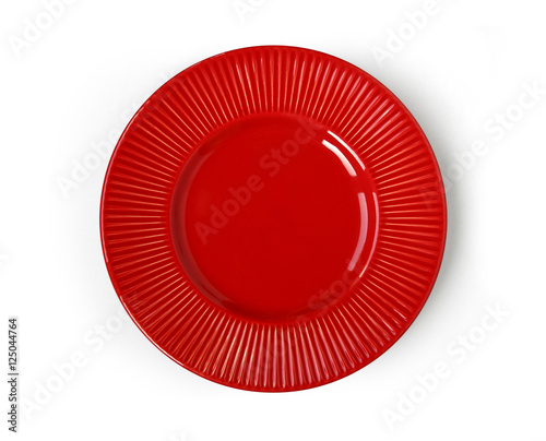 Empty stylish red ceramic round plate with ornament isolated on white background. Top view