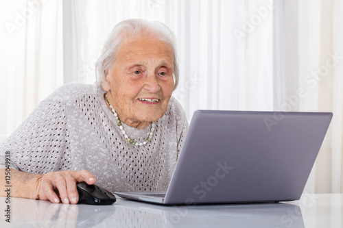 Senior Woman Using Laptop