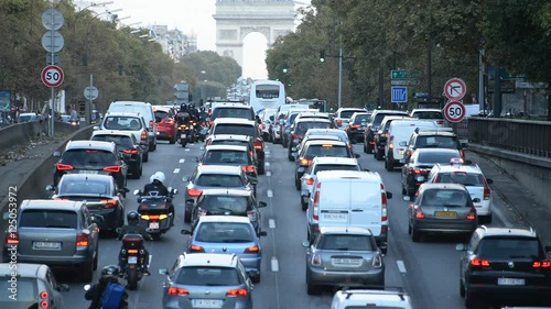 Traffic in Paris - Arc De Triomphe Du in the Background - Paris France