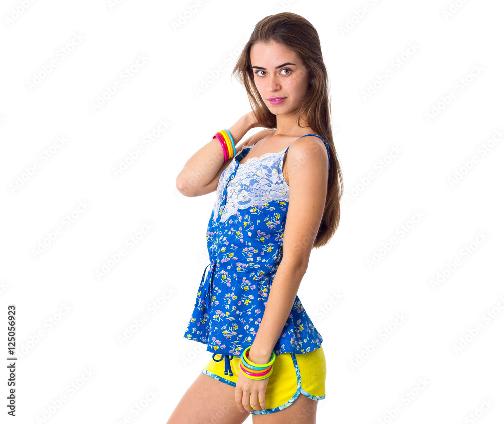 Woman standing sidewise and looking away Woman standing sidewise and looking away