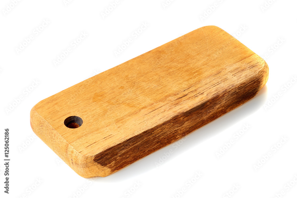 Wooden chopping board on white