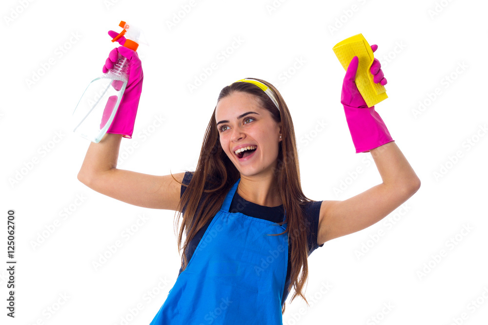 Woman holding detergent and duster Woman holding detergent and duster