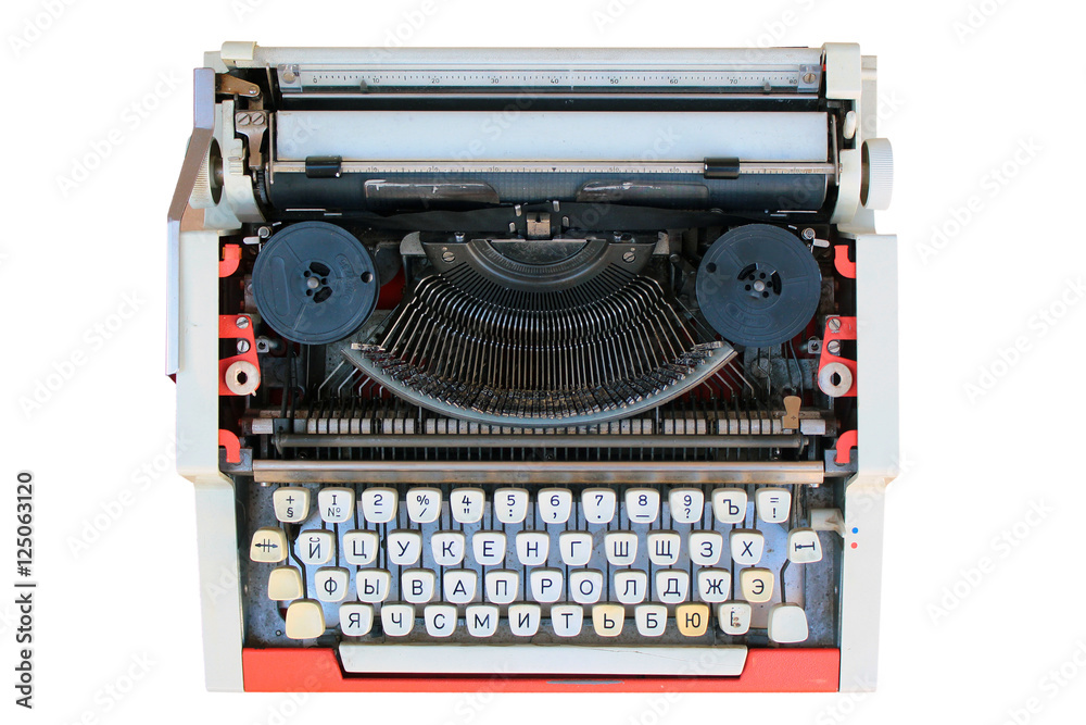 Old typewriter with russian keyboard, isolated on white