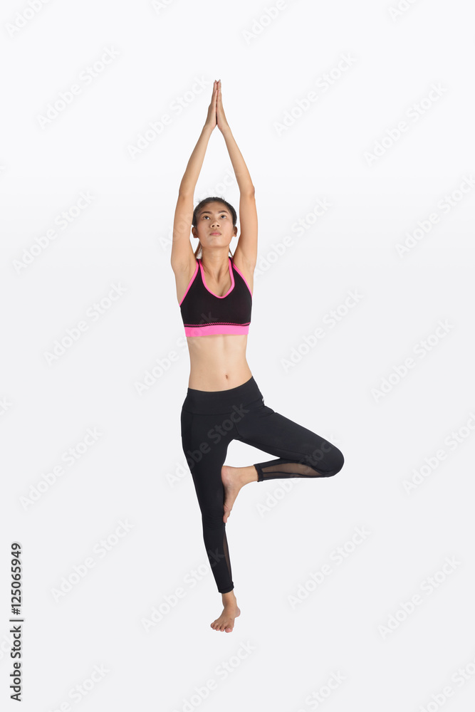 Young woman in yoga pose. Young woman in yoga pose.