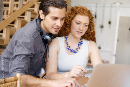 Two young designers in office