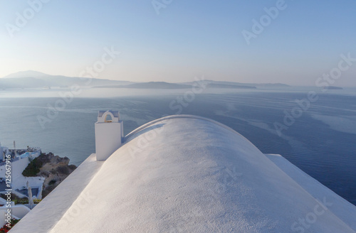 roof of traditional whitewashed Cycladic house in Oia on Santorini