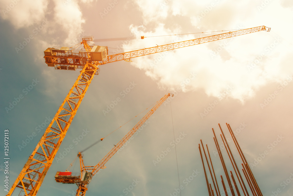 Tower crane - used in construction site with filter Stock Photo | Adobe ...