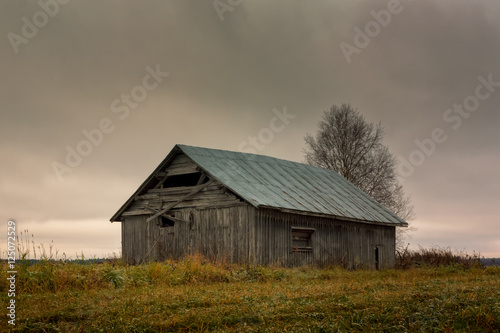 Abandoned Barn House On The Autumn Fields