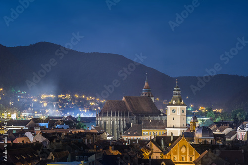 Night scape, image with Council House (city-hall) built in 15th century by saxons, and Black Church in Brasov.