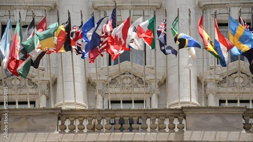 International Flags fly in the Wind photo