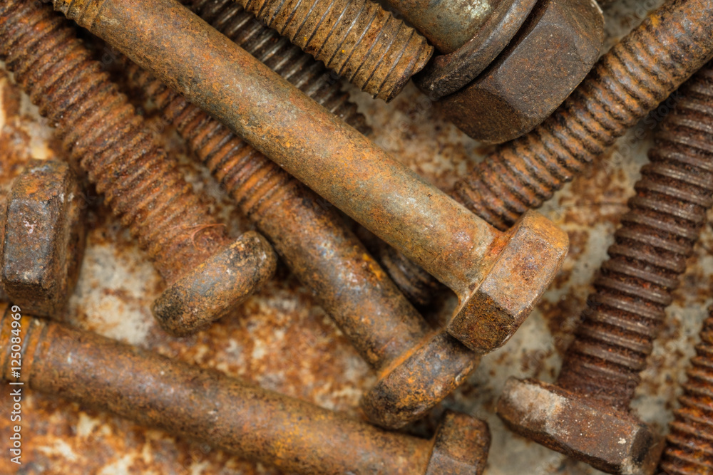 old rusty bolts dirty on rusty metal plate old rusty bolts dirty on rusty metal plate