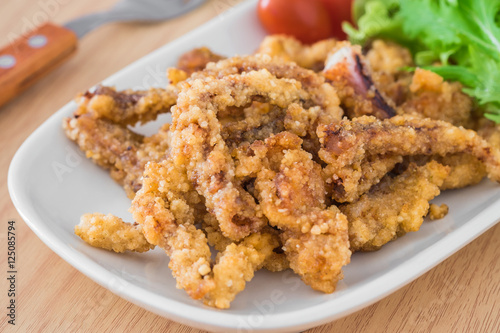 Fried tentacles squid on plate