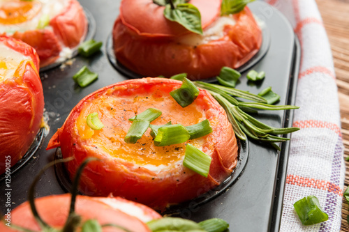 Stuffed baked tomatoes with eggs and green onion