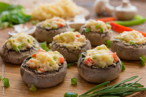 Baked mushrooms with white sauce and vegetables