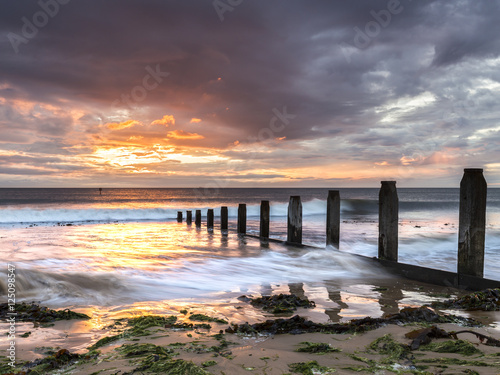 Redcar Cleveland sunrise over the sea and waves photo