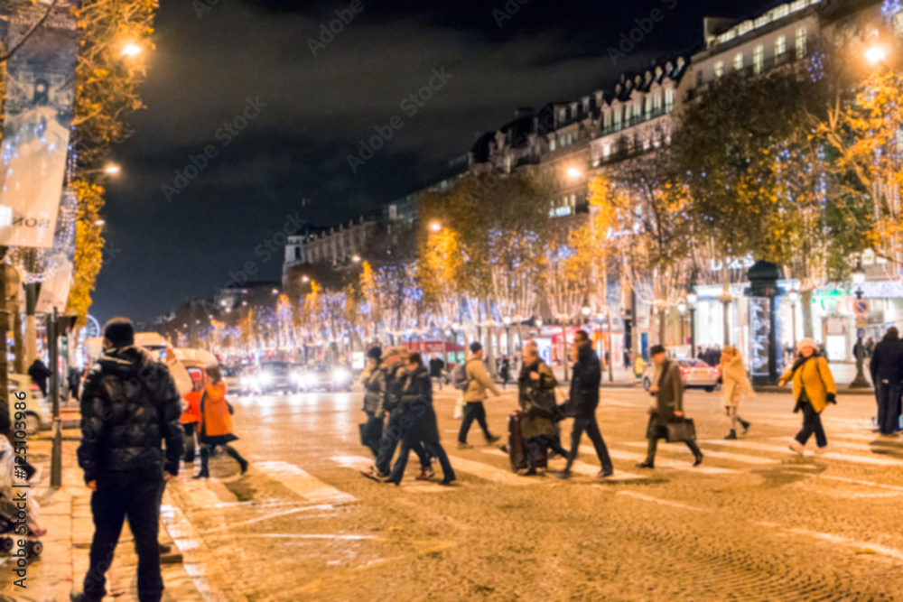 Blur of People Across the street near Champs-Elysees,Paris,France at night