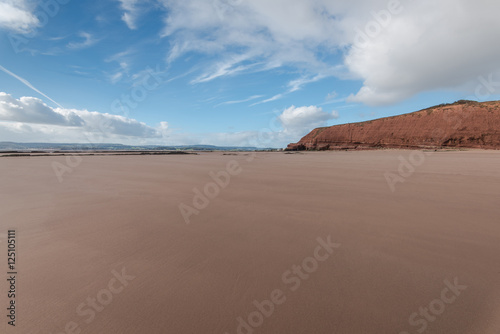 sandy beach with red sand in Exmouth ,Devon, UK